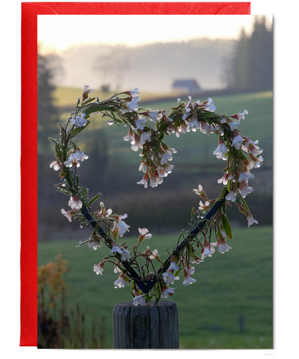 heart-shaped wreath made of wildflowers