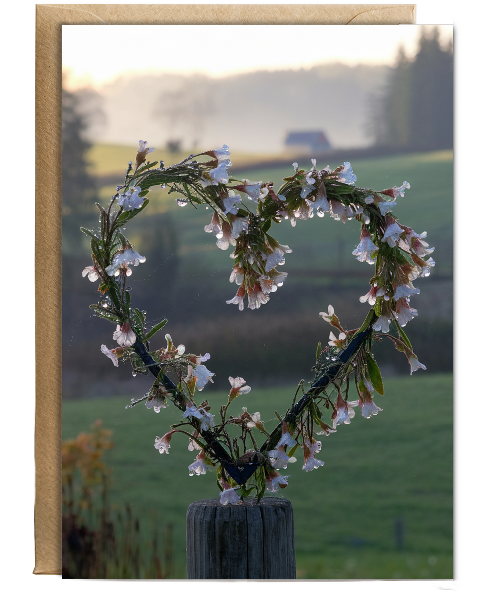 heart-shaped wreath made of wildflowers