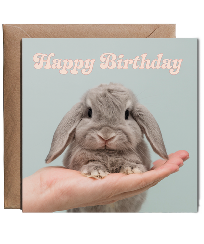Happy Birthday card bunny on hand pastel blue