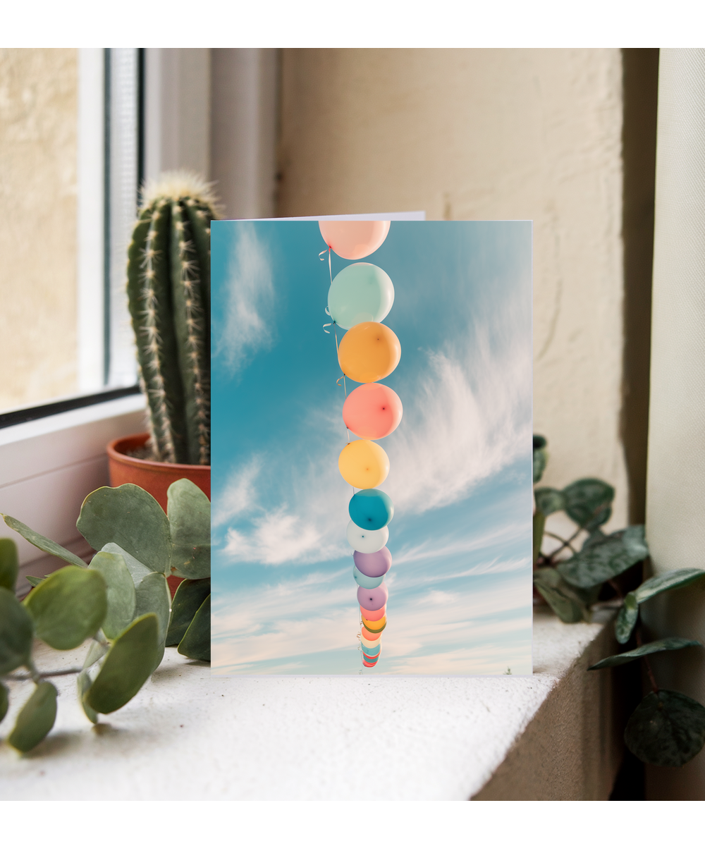 Rainbow Balloons Floating in the Sky