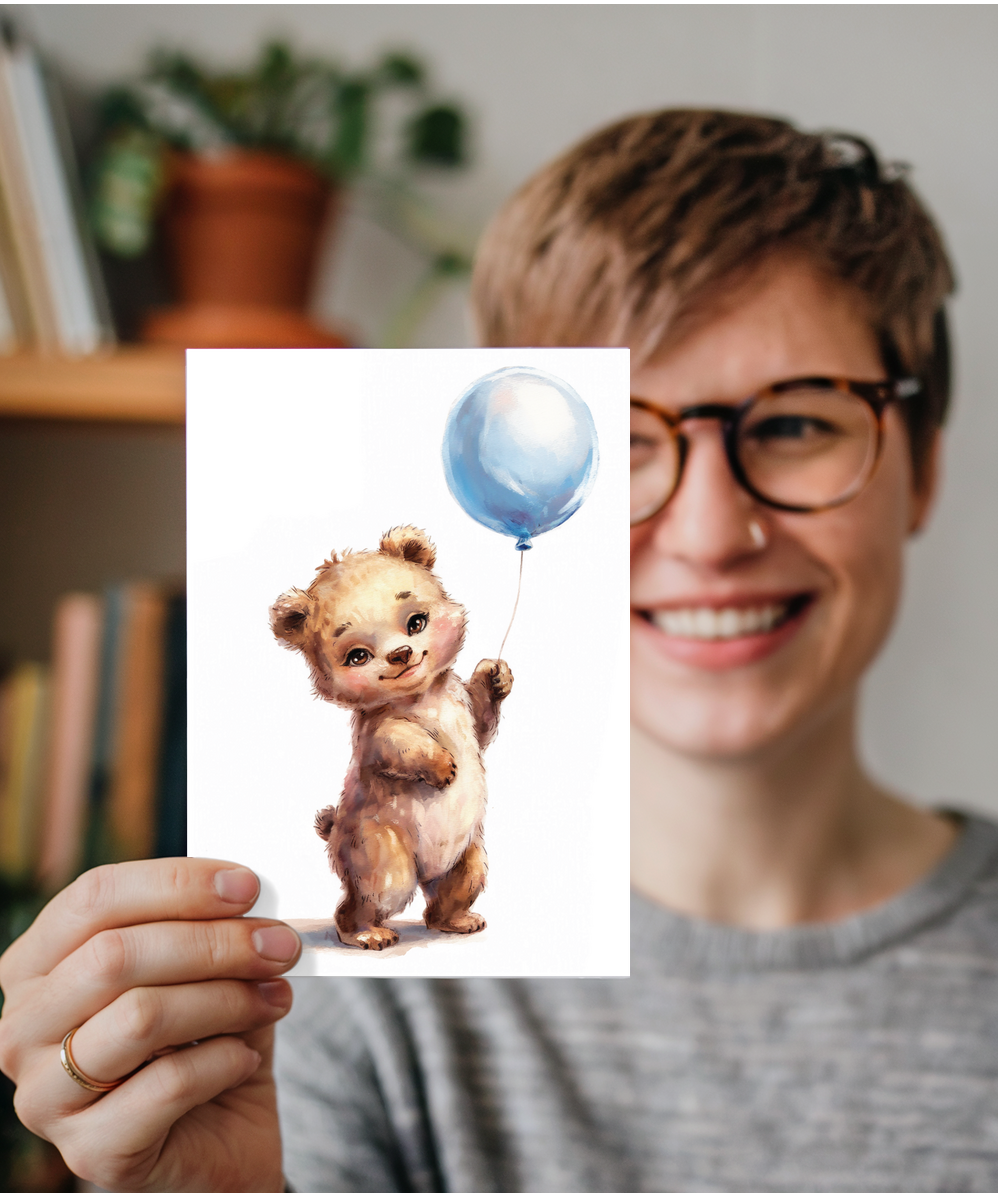 Bear cub with blue balloon