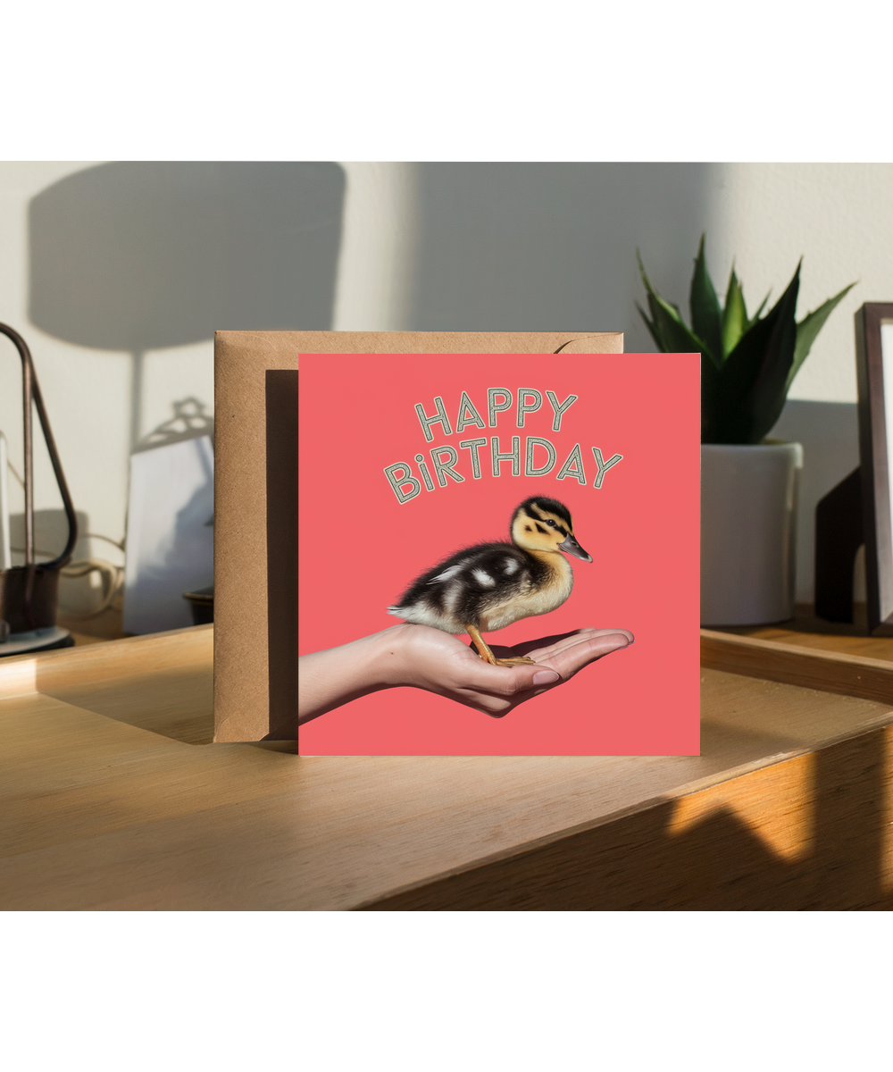 Happy Birthday card duck in hand cute coral