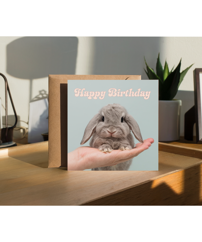 Happy Birthday card bunny on hand pastel blue