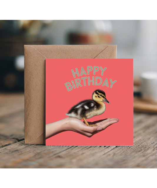Happy Birthday card duck in hand cute coral