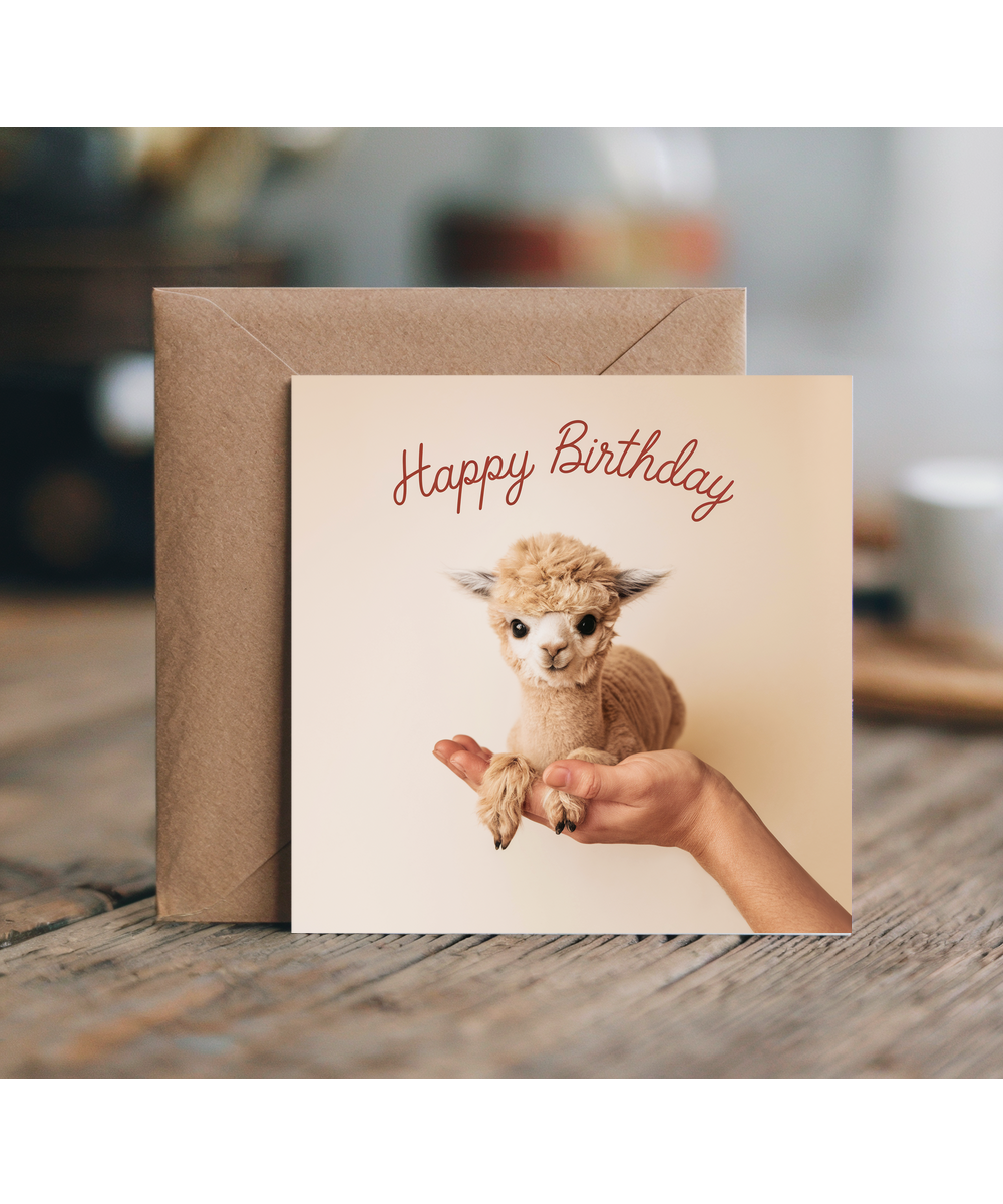 Happy Birthday card alpaca in hand cute pastel colour