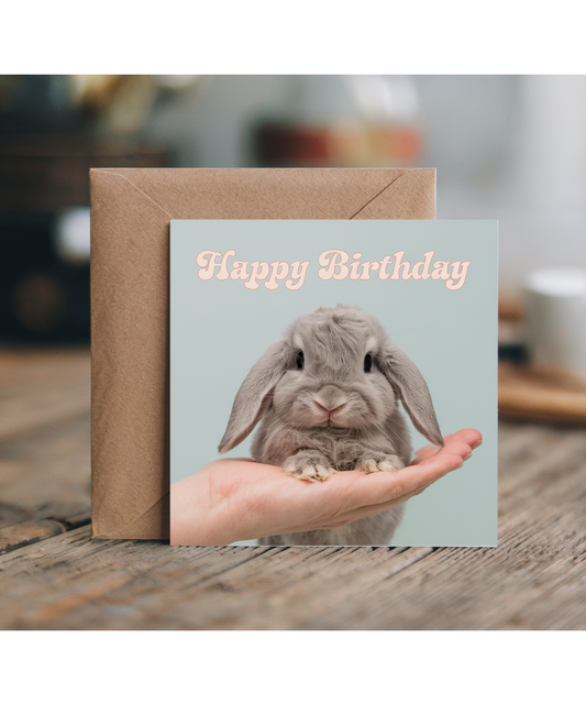 Happy Birthday card bunny on hand pastel blue