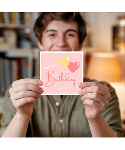 Happy Birthday card sending you love heart balloon