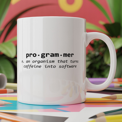 Programmer definition - an organism that turns caffeine into software